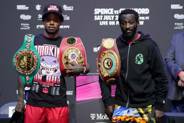 Errol Spence Jr. and Terence Crawford pose during a news conference