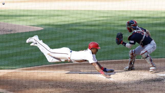 Aug 17, 2023; Washington, District of Columbia, USA; Washington Nationals second baseman Jeter Downs (3) scores a run ahead of a tag by Boston Red Sox catcher Connor Wong (12) on a two run double by Nationals designated hitter Joey Meneses (not pictured) during the fifth inning at Nationals Park.