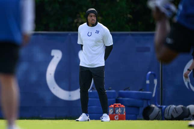Indianapolis Colts running back Jonathan Taylor watches a drill from the sidelines during the Indianapolis Colts Training Camp on August 1, 2023.